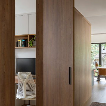 Hidden Home Office Behind Custom Millwork | Hearth Residence | Whole Home Renova