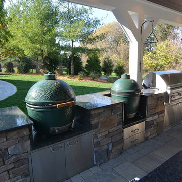 Custom Freeform style salt water in ground pool with Waterslide and Spa