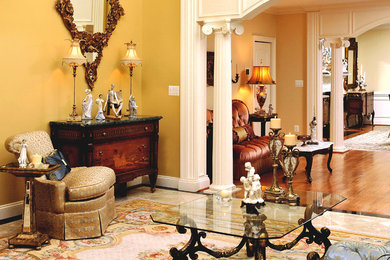 Mid-sized elegant beige floor living room photo in DC Metro with yellow walls