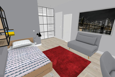 Aménagement d'une chambre grise et blanche industrielle de taille moyenne avec sol en stratifié, un sol marron et dressing.