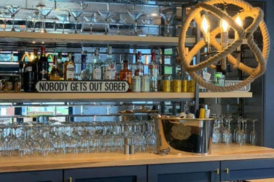 Home bar - industrial home bar idea in Manchester