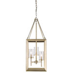 Golden - Golden Lighting 2073-3P WG-CLR Smyth 3 Light Pendant (White Gold & Clear Glass) - Modern lanterns featuring a handsome beveled cage design make a modern, elegant statement in the Smyth collection. Clean geometry creates contemporary style with steel candles and candelabra bulbs encased in two glass options. The fixtures are offered in 3 finishes: Chrome, Gunmetal Bronze and White Gold. The gleaming Chrome finish adds a sleek, contemporary option to this open-caged collection. A darker option, the Gunmetal Bronze finish has warm bronze undertones and is perfect for all industrial or vintage aesthetics. The White Gold finish option softens the geometric form, creating a more delicate and transitional appearance. Glass fixtures are available with Clear Glass or Opal Glass shades. Ideal for a small dining, nook or entry, this 3-light pendant provides a glowing presence.