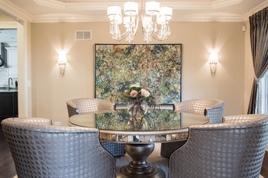 Example of a mid-sized trendy dark wood floor enclosed dining room design in Other with beige walls and no fireplace