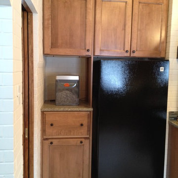 After photo of recycling and freezer space.
