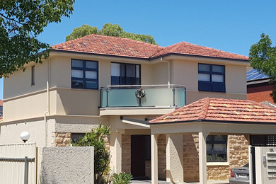 Photo of a modern home design in Adelaide.