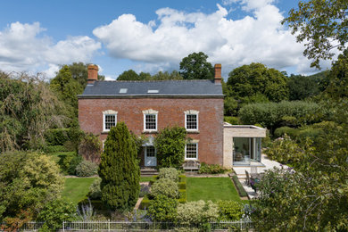 Design ideas for a contemporary house exterior in Gloucestershire.
