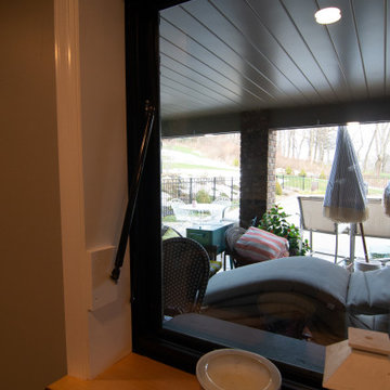Basement Utilizing Open Space to Shoot Pool and Watch Favorite Sports Team