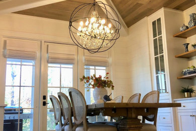 Example of a farmhouse dining room design in Other