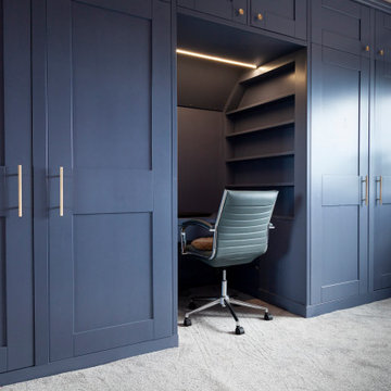 Wardrobe with integrated desk