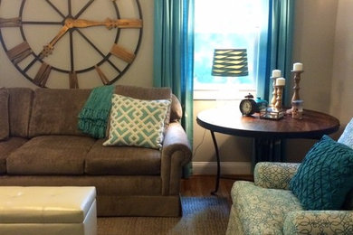 Inspiration for a mid-sized transitional open concept medium tone wood floor and brown floor family room remodel in DC Metro with beige walls, no fireplace and no tv