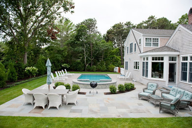 Example of a beach style patio design in Other