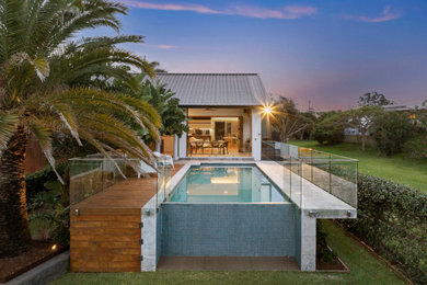 This is an example of a contemporary pool in Gold Coast - Tweed.