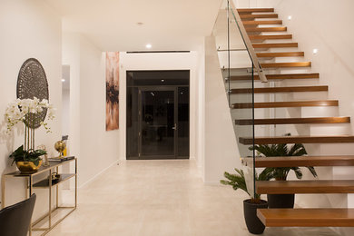 Design ideas for a contemporary entryway in Gold Coast - Tweed.