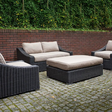 Toja Patio Furniture - Tuscan Love Seat Set - Red Brick Wall