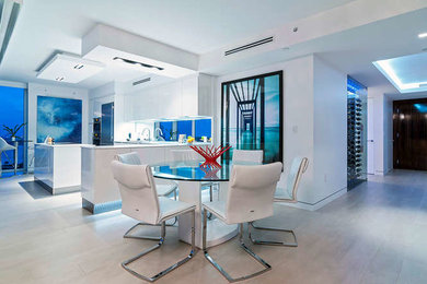 Inspiration for a contemporary dining room remodel in Miami