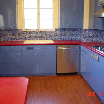 Kitchen Retro Remodel with custom colored glass backsplash & Cork Floor