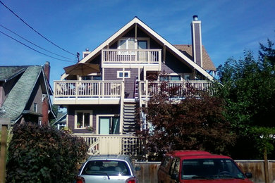 Mid-sized arts and crafts three-story wood exterior home photo in Vancouver