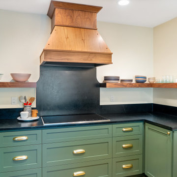 Turquoise Kitchen Cabinets and Black Marble Countertops