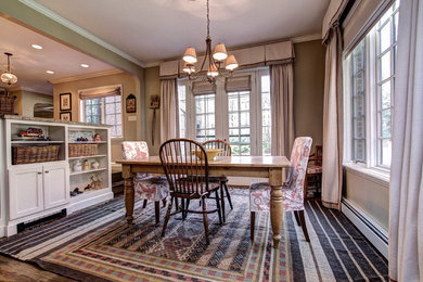 Inspiration for a mid-sized cottage dark wood floor and brown floor kitchen/dining room combo remodel in Denver with beige walls and no fireplace