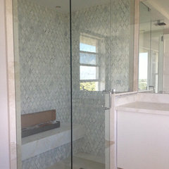 MIRRTIQUE SHOWERS & GLASS INC