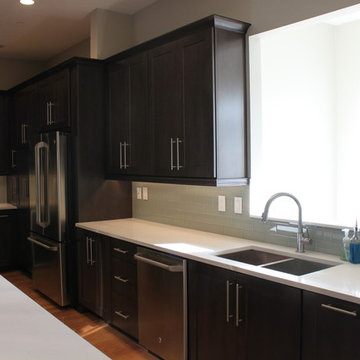 After: New cabinets, countertops, backsplash, sink & faucet