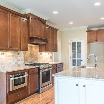 Convenient, delightful kitchen space with french door pantry