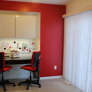 Inspiration for a small modern study in Ottawa with red walls, carpet and a freestanding desk.
