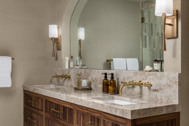 Inspiration for a mid-sized transitional master beige tile porcelain tile, beige floor and double-sink bathroom remodel in Atlanta with beaded inset cabinets, dark wood cabinets, a one-piece toilet, beige walls, an undermount sink, quartzite countertops, a hinged shower door, beige countertops, a niche and a built-in vanity