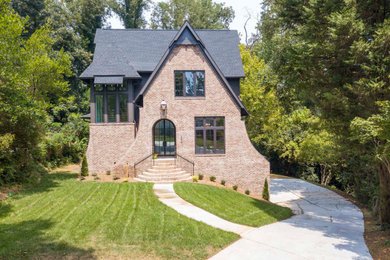 Example of a french country home design design in Charlotte