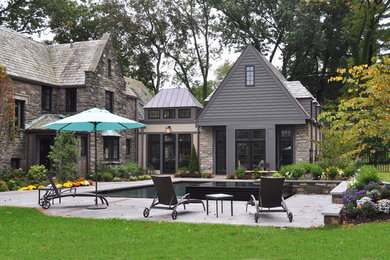 Example of a classic patio design in Philadelphia with no cover