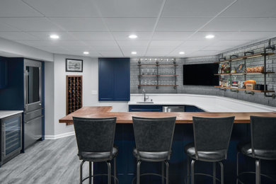 Inspiration for a modern basement remodel in Milwaukee