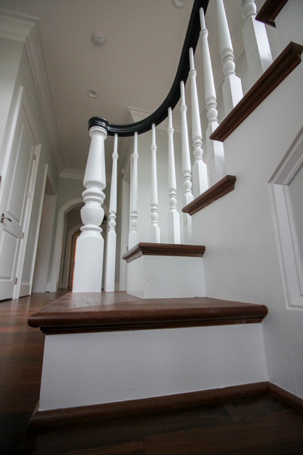 Powerful Impression by Floating Staircase in Suburban Foyer