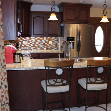 Kitchen Design: StarMark Cabinetry in Oak Royale, HD Formica Countertop