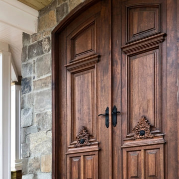 Imposing vintage double door: European rustic elegance.