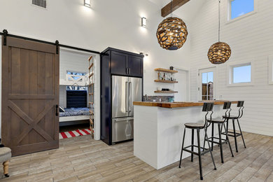 Inspiration for a farmhouse home design remodel in Austin