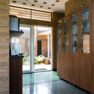 Idee per un ingresso o corridoio etnico con pavimento turchese