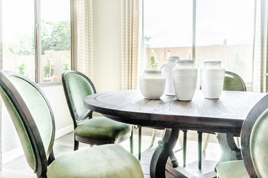 Example of a mid-sized transitional porcelain tile and brown floor dining room design in Phoenix