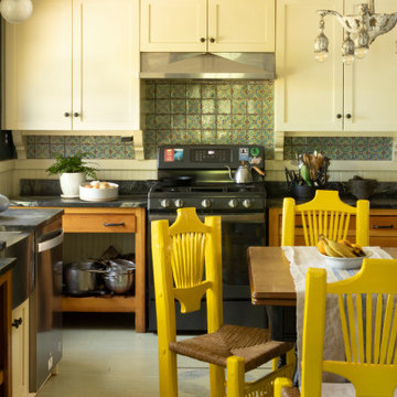 Artists’ Farm House Vintage Inspired Kitchen With Pops of Color
