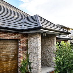 BUILDING THE DREAM - Roofing And Gutters