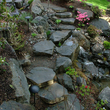Steep Backyard With Water Feature