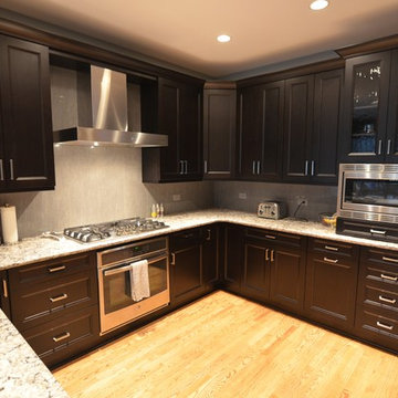 Dark Maple Kitchen with Modern Style and Surfaces in Aurora