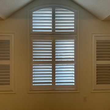 California Shutter Arches and Blackout Shades Behind Shutters