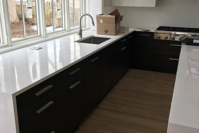 Example of a mid-sized minimalist kitchen design in Boston
