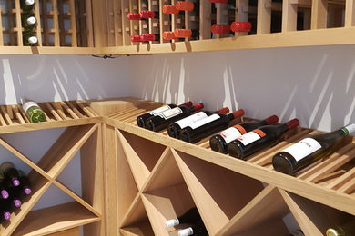 Design ideas for a contemporary wine cellar in Sydney.