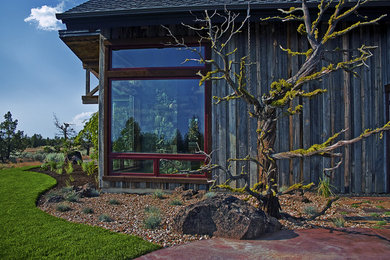 Inspiration for a mid-sized farmhouse full sun side yard landscaping in Other for summer.