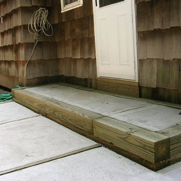 Retaining Walls, Concrete Patio, Brick Walkway and Steps