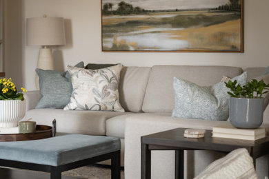 Inspiration for a mid-sized transitional open concept medium tone wood floor, brown floor and shiplap wall living room remodel in Toronto with beige walls, a standard fireplace, a tile fireplace and a media wall