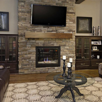 Living room with stacked stone fireplace