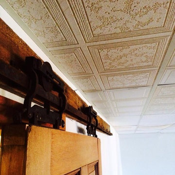 Restored farmhouse door with original antique pocket door sliders