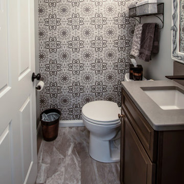 Maple Stained Shaker Wet Bar with Matching Tile in Powder Room